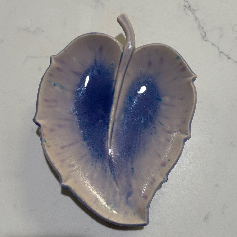 Leaf-Shaped Ceramic Dish in Lavender with Deep Blue Center .